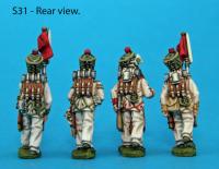 S31 - 4 Saxon grenadiers in march-attack poses. Covered shakos.
