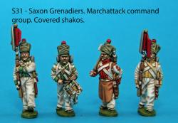 S31 - 4 Saxon grenadiers in march-attack poses. Covered shakos.