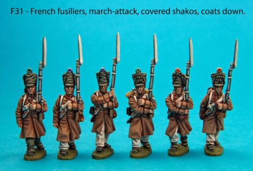 F31 Six centre company figures in march-attack poses.