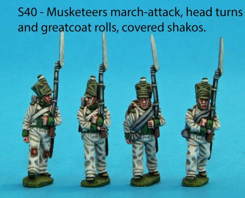 S40 - Four Saxon musketeers in march attack poses. Head turns and greatcoat rolls. Covered shakos.
